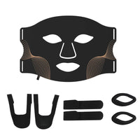 Black face mask with attachments on a white background