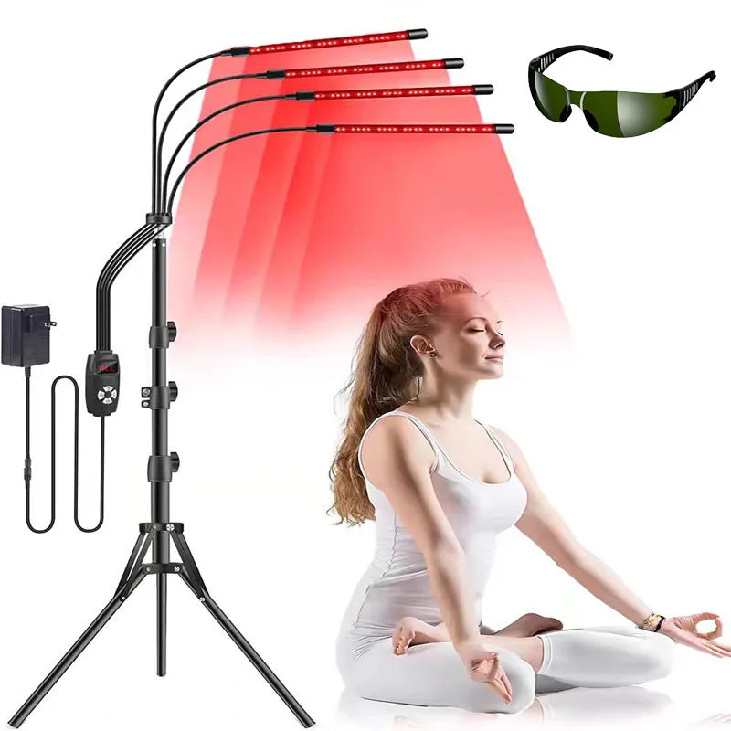 Woman receiving red light therapy with a lamp and goggles on a white background