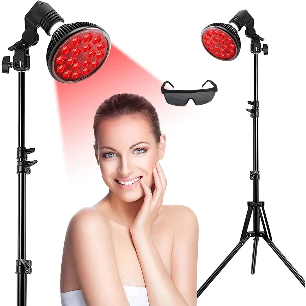 Red light therapy lamp set with two black LED lamps on stands, a pair of black goggle glasses, and a smiling woman in the center. Text reads 'Gift:Gogglasses'.
