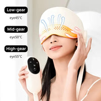 women using head massager with heat