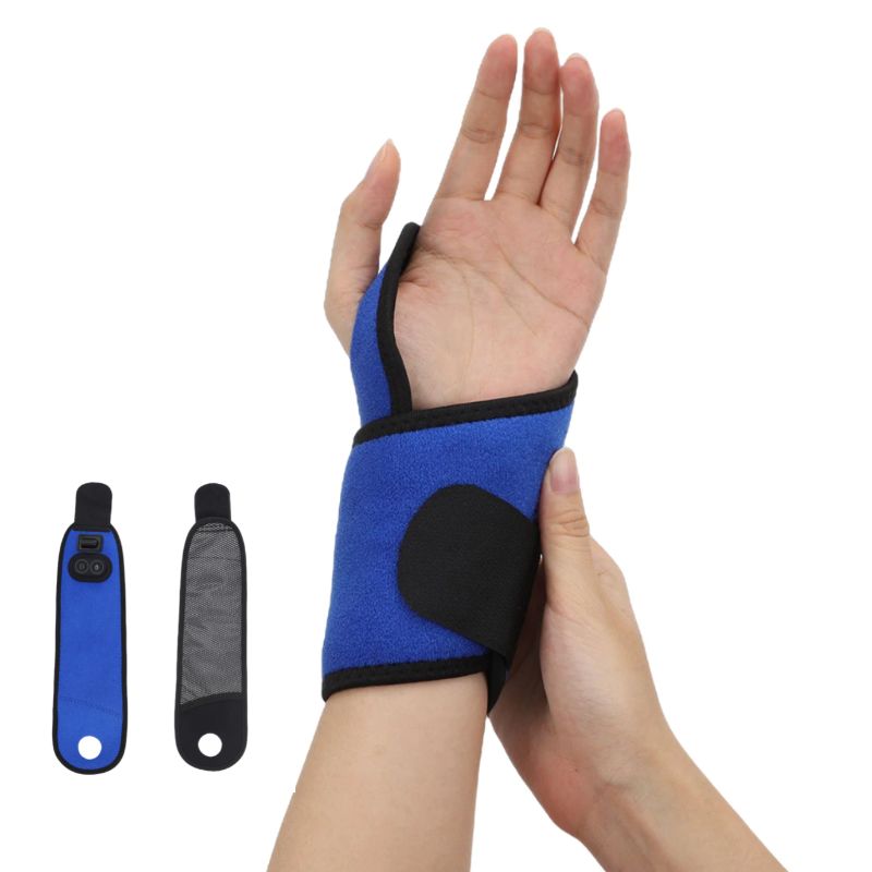 A person's wrist wearing a blue and black heated wrist brace with vibration massage features.