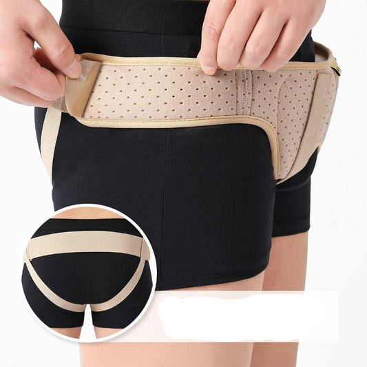 Person wearing a black garment with a beige support belt, showing close-up details.